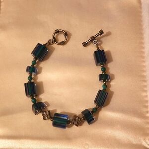 Silver bracelet with blue cyrsstals